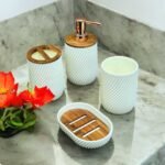 Bathroom soap dispenser set in white and gold, 4-piece set with toothbrush and soap holder, cup and soap dispenser.