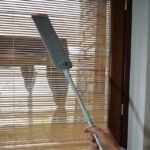 Gap duster brush for cleaning blinds and curtains.