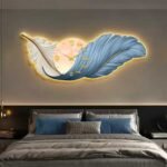 Majestic blue modern feather wall clock lighting up bedroom.