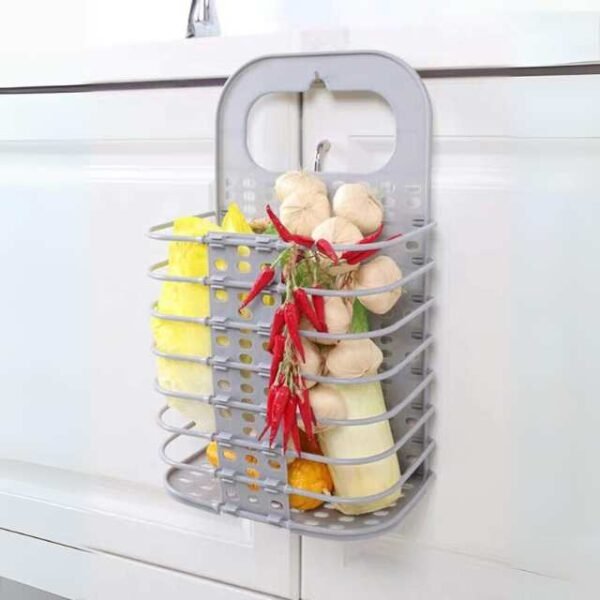 Portable basket on kitchen counter holding kitchen ingredients.