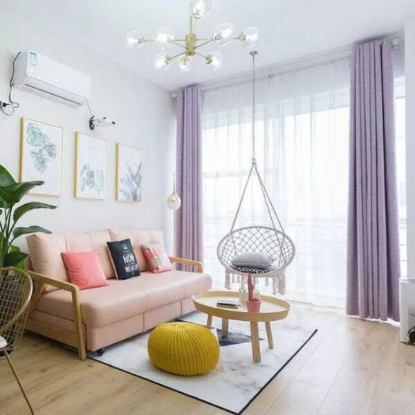 Beige swing hammock chair in living room complementing any decor.