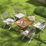 Four chairs arranged around an aluminum camping table, holding up to 50kg.