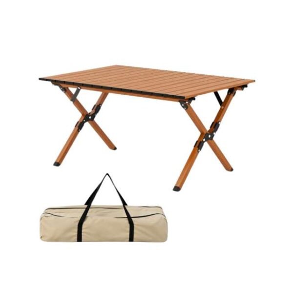 Outdoor folding picnic table next to carry case on white background.