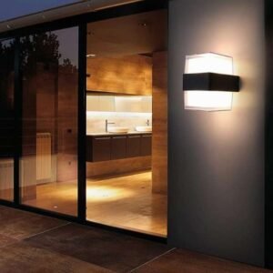 Angular wall light near home entrance with warm light