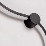 Close-up of curved wall light. Made from high-quality aluminum for durability.