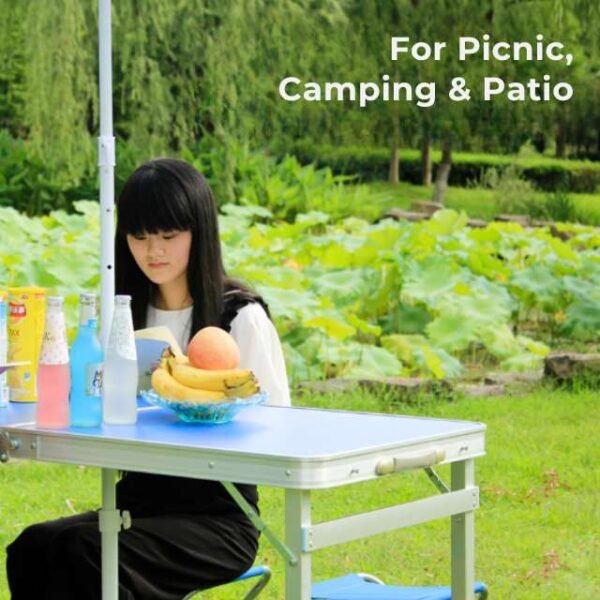 Woman enjoying snacks on our picnic table set outdoors.