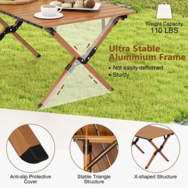 Heavy-duty aluminum frame of camping table with x-shaped legs and anti-slip feet.