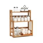 3-Tier bamboo spice rack with spice jars on a white background.