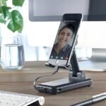 Multifunctional power bank used as phone holder during video call.