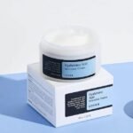 COSRX skin hydration cream placed on package for daily skin hydration and nourishment.