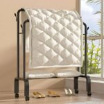 Double pole coat rack used on balcony for drying and airing bedding sheets and pillows.