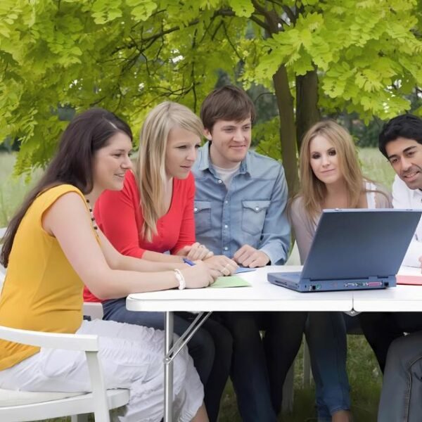 Students using folding study table for online lecture.