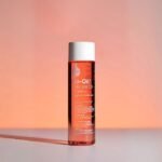 Bio-Oil skincare oil bottle displayed on table showcasing compact size and benefits.