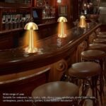 Dimmable mushroom table lamps on bar counter, versatile for various settings.