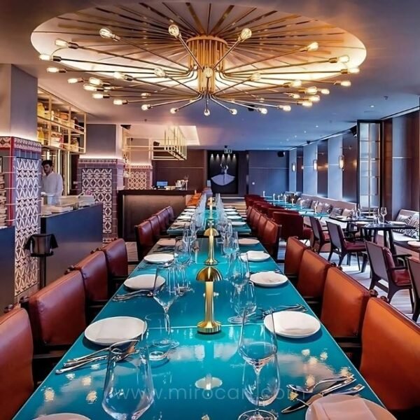 Mushroom table lamps on long restaurant table creating ambiance.