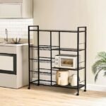 Kitchen storage cart with metal design, neatly placed in compact space.