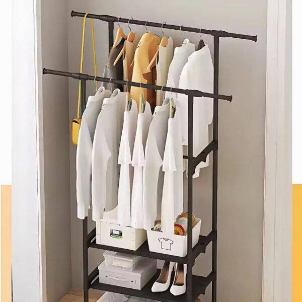 Close-up of double rods on minimalist clothes rack for hanging clothes and coats.