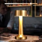Minimalist golden table lamp showing 3-level brightness for mood setting.