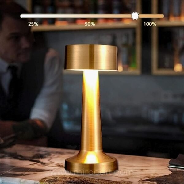 Minimalist golden table lamp showing 3-level brightness for mood setting.