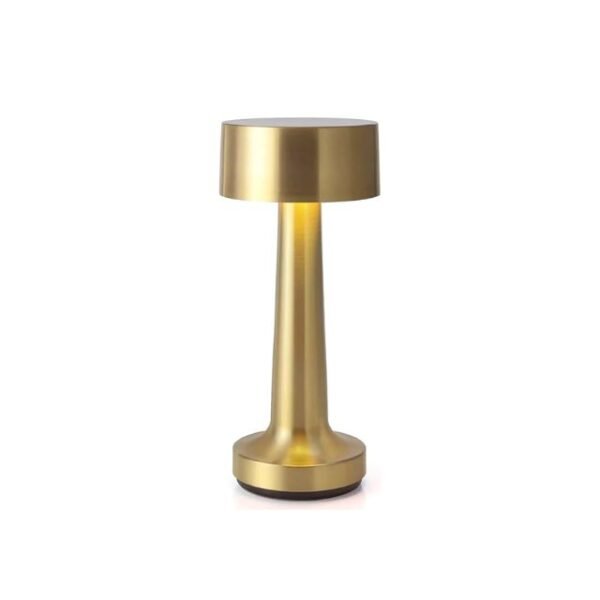 Minimalist table lamp with golden finish and sleek metal design on white background.