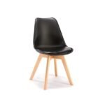 Modern black dining chair with padded seat and wooden legs.