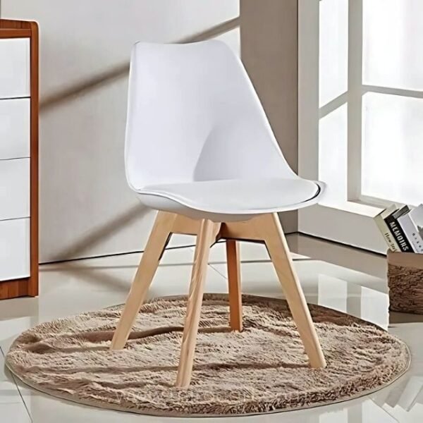 Modern white dining chair with ergonomic design and padded seat in bedroom.