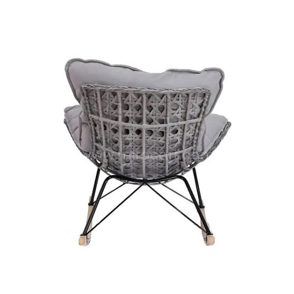 Back view of rocking egg chair highlighting rattan design and sturdy base.