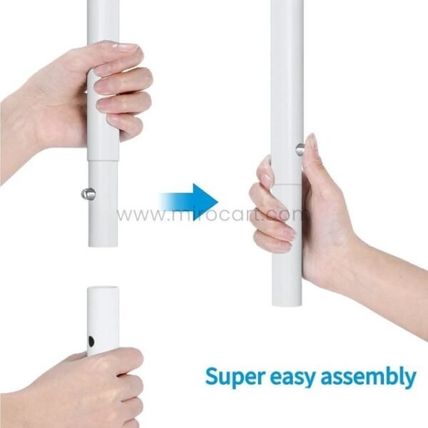 Hands assembling two poles with a push-button mechanism for the extendible clothes rack.