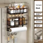 Black spice rack with labeled dimensions, paper towel holder, and utensil hooks.
