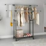 Modern 2-tier rack with double hanging bars, shoe shelf, and displayed accessories.