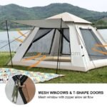 Automatic camping tent with mesh windows and T-shape doors near a lake and mountains. Orange arrows highlight airflow for ventilation.