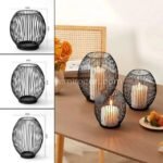 Three black lantern candle holders in small, medium, and large sizes.