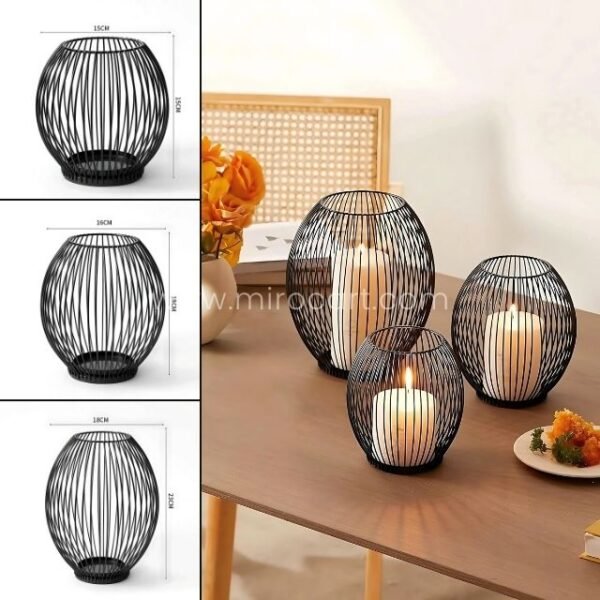 Three black lantern candle holders in small, medium, and large sizes.