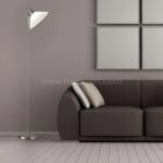 Adesso Swivel Floor Lamp with a silver pole and white shade, placed near a modern sofa in a clean, minimalist living room.