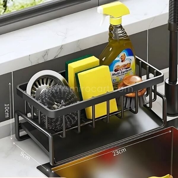 Stainless kitchen sink caddy measuring twenty three centimeters with organized compartments for cleaning supplies.