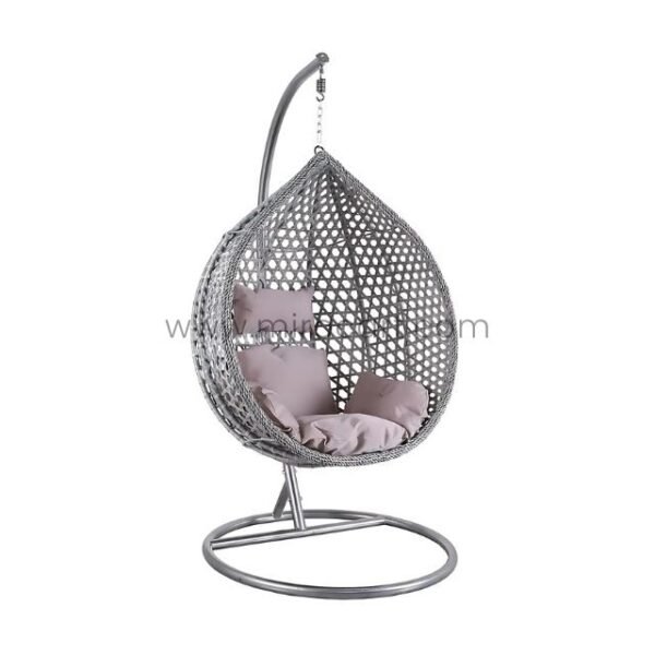 Minimalist light grey egg chair with black stand in contemporary living room setting