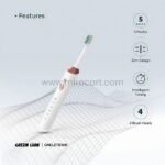 The Green Lion electric toothbrush displayed with key features like 5 modes, slim design, intelligent timing, and interchangeable brush heads.