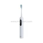 Close-up of the Green Lion Smart Toothbrush emphasizing its compact design and vibrant TFT display