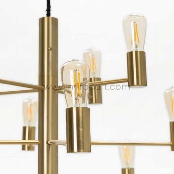 A detailed close-up highlighting the chandelier’s polished gold frame and exposed filament bulbs.
