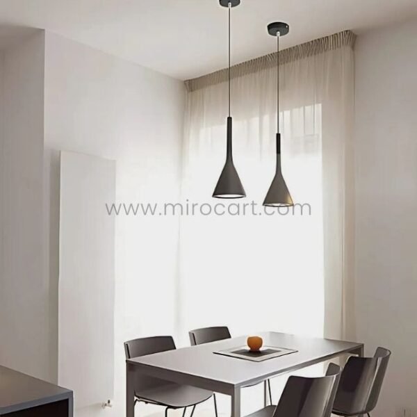 Two Nordic Cone Pendant Lamps in grey suspended above a dining table near a window with sheer curtains, casting soft light.