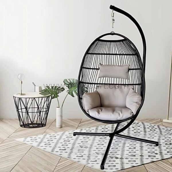 Premium Hanging Egg Chair with a sleek black frame and cushioned seat, placed on a stylish rug in a minimalist living room setting.