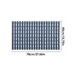 A blue textured non-slip bathroom mat, showcasing its sleek design and durable construction.