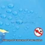 Water droplets beading on the surface of an underwater-themed shower curtain, highlighting waterproof qualities.