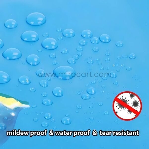 Water droplets beading on the surface of an underwater-themed shower curtain, highlighting waterproof qualities.