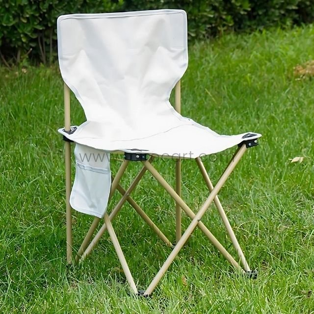 Lightweight easy-fold camping chair with beige fabric and steel frame on grass