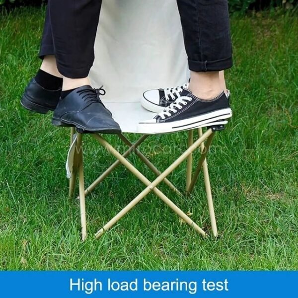 Two users standing on sturdy camping chair.