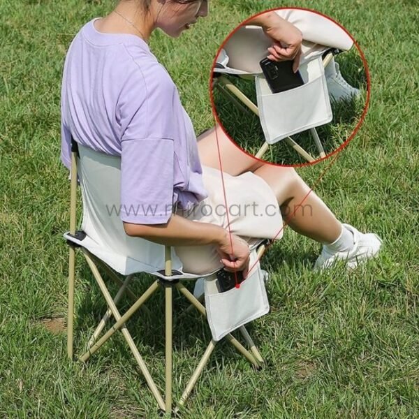 Woman storing phone in chair pocket.
