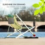 Foldable sun lounger in use with drink in holder and magazine tucked in pocket.