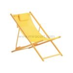 Vibrant yellow foldable sun lounger against neutral background.