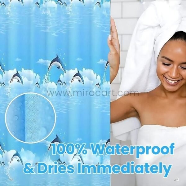 Woman wrapped in a towel smiling next to a waterproof dolphin shower curtain.